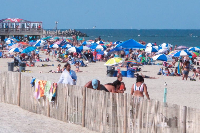 Beachgoers enjoy a sunny day at Point Pleasant Beach, N.J., in 2019.