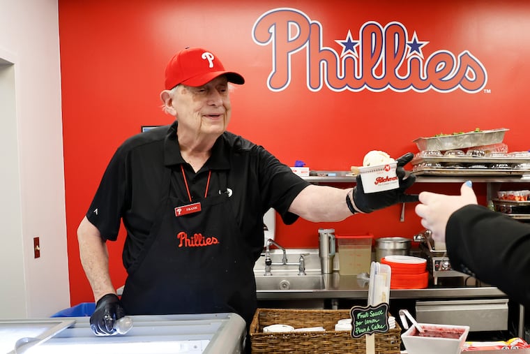 Frank Mazzuca, 82, aka “Frankie Two Scoops” serves ice cream in the Citizens Bank Park press box dining room on Saturday.