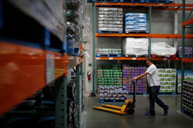 Shelves are stocked at a Costco store in Louisville, Ky. Costco Wholesale Corp., the largest U.S. warehouse-club chain, posted a fiscal third-quarter profit Thursday that missed analysts' estimates even as comparable sales rose 6 percent in a quarter in which retailers endured harsh weather. Net income in the quarter ended May 11 rose 3.1 percent to $473 million, or $1.07 a share, from $459 million, or $1.04, a year earlier. Analysts had projected $1.10.