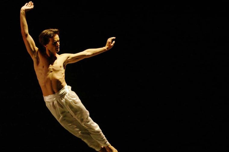 PARSONS -- Dancer Angel Corella participates in a dress rehearsal of "Caught" at New York University in New York, Thursday, Oct. 2, 2003. In choreographer David Parsons' stunning dance Corella quite literally flew _ thanks to one strobe light, one inventive choreographer, one perfect dancer's body and 90 exhausting jumps. (AP Photo/ Mike Appleton)