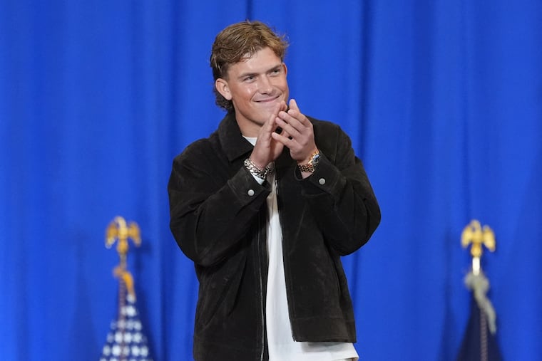 New York Giants quarterback Jaxson Dart introduces President Donald Trump at Rockland Community College on Friday.