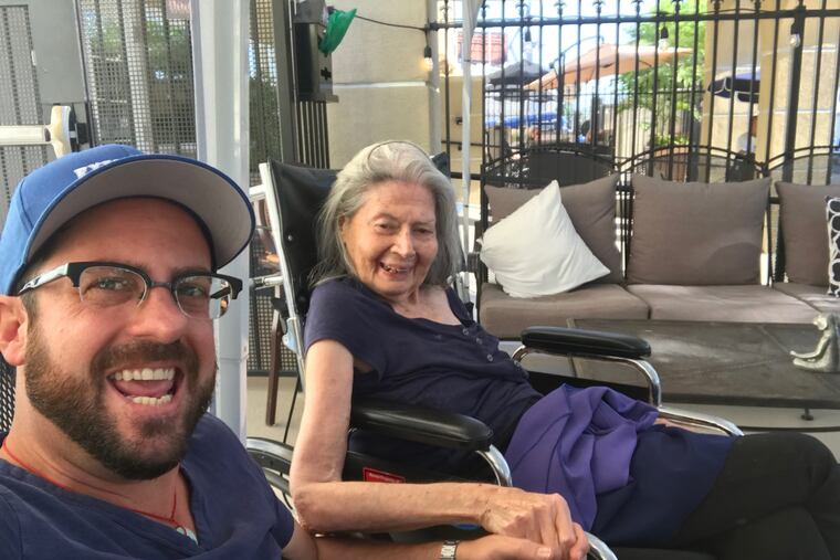 Muriel Klein and comedian Michael Piper-Younie in July 2019.