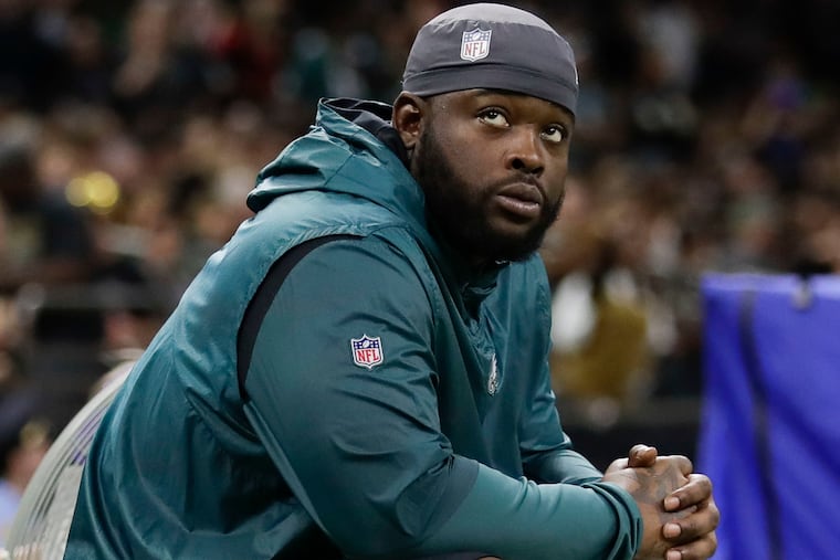 Eagles defensive tackle Timmy Jernigan watches his teammates take on the New Orleans Saints on Sunday, November 18, 2018 in New Orleans. YONG KIM / Staff Photographer