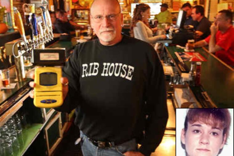 Deets Radcliff, owner of Bridgeport Rib House, holds an ID scanner like the one that was allegedly stolen by Gina Kepler (inset), a former liquor control officer. ( Michael Bryant / Staff Photographer )