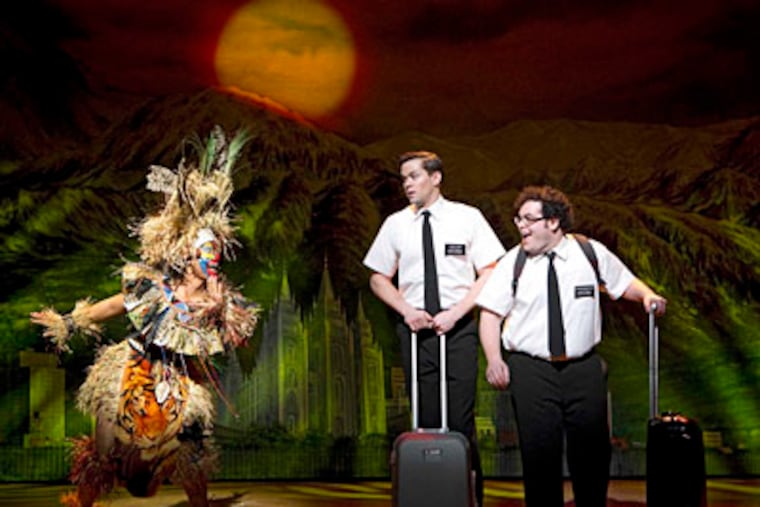 Rema Webb, Andrew Rannells and Josh Gad perform in "The Book of
Mormon" at the Eugene O'Neill Theatre in New York. (AP Photo/Boneau/Bryan-Brown, Joan Marcus)