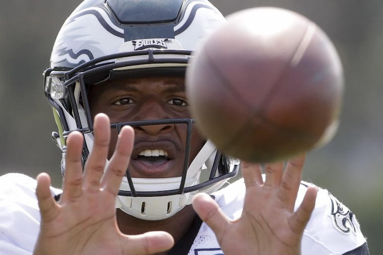 Rasul Douglas catches a ball during a training-camp drill.
