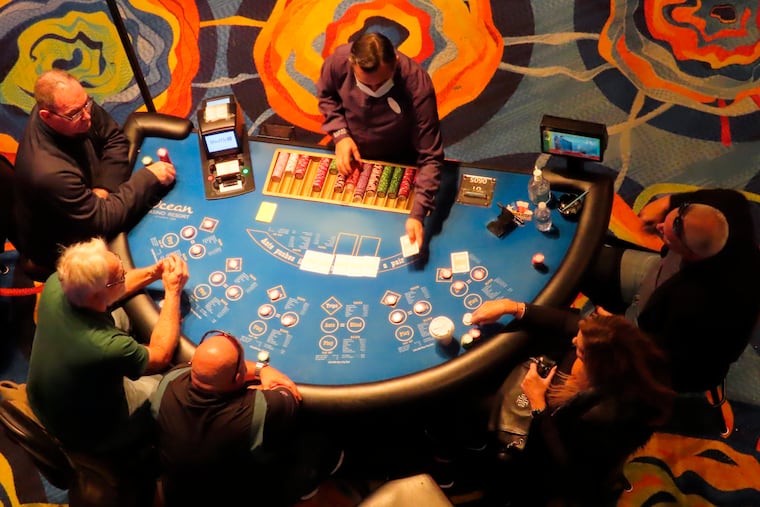 A dealer conducts a card game at the Ocean Casino Resort in Atlantic City. New Jersey gambling regulators released figures on Friday, Dec. 16, 2022, showing that Atlantic City's casinos and the three horse tracks that accept sports bets won just over $441 million in November, an increase of 0.3% from a year earlier.