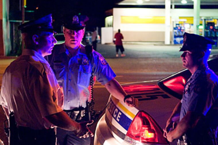 Operation Pressure Point (here, officers of the 39th District) continues, but the new focus is on foot beats, problem-solving, and targeting known criminals. (Kriston J. Bethel/Staff)