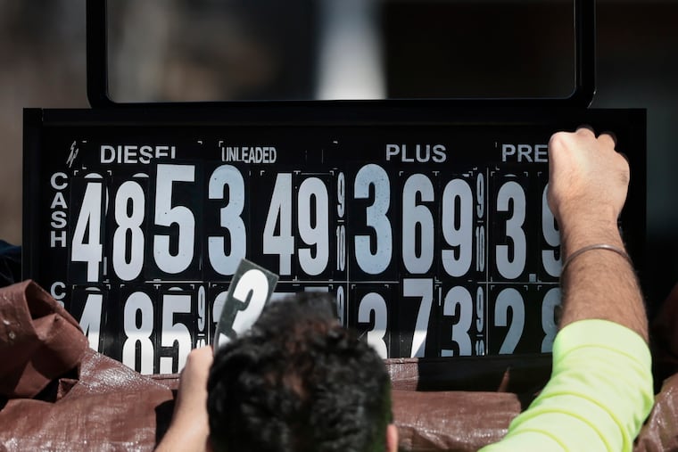 A man at the Star Gas station in Blackwood raises the price of fuel on Monday, March 9, 2026.