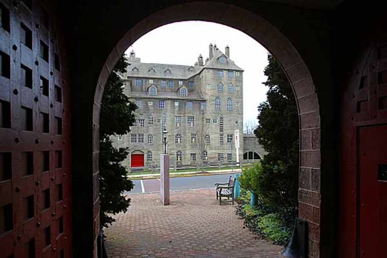 Profile of the Borough of Doylestown. The Mercer Museum is seen through an archway at the entrance to the Michener Museum. ( Charles Fox / Staff Photographer )