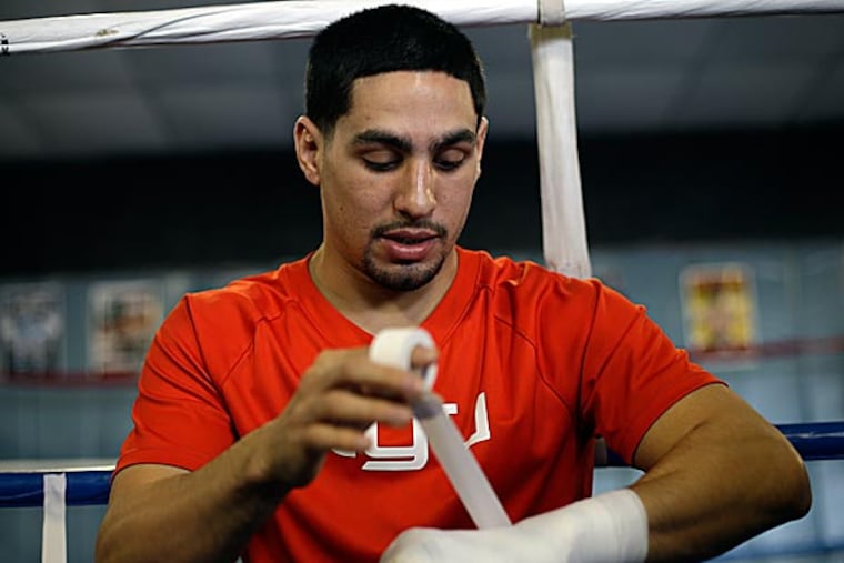 Danny Garcia will meet Zab Judah in a 12-round title defense Saturday in Brooklyn's Barclays Center. (Matt Rourke/AP)