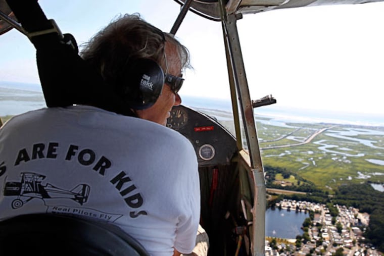 Jim Dahlen, of Paramount Air Services, flies toward North Wildwood Beach. (Michael Bryant/Staff Photographer)