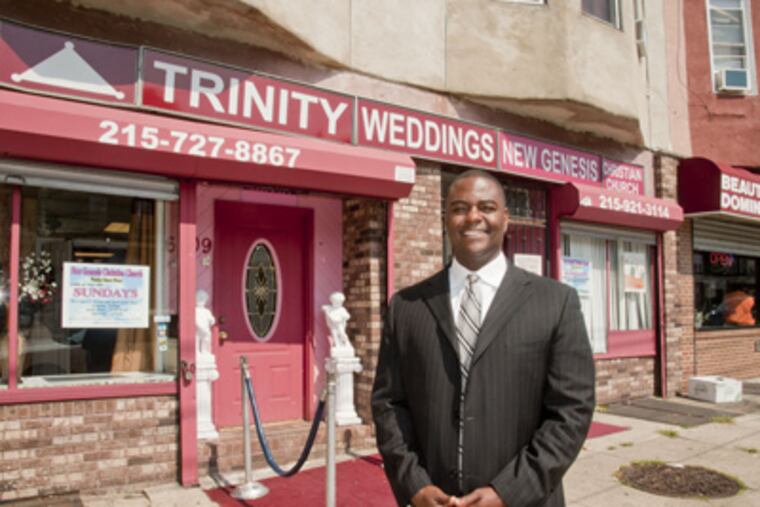 Pastor David Price at his combination Trinity Wedding Center and New Genesis Christian Church on Woodland Avenue in Southwest Philadelphia. (Clem Murray / Staff Photographer)