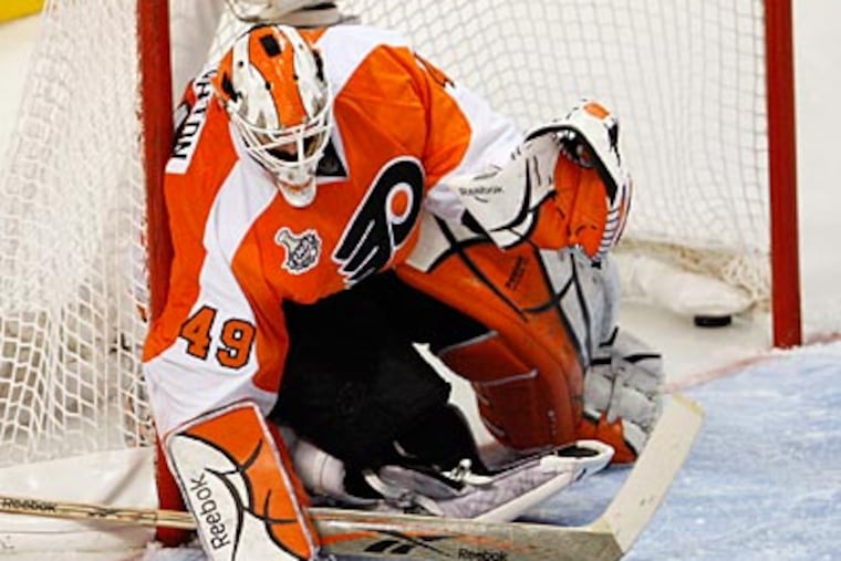 In 2010, Flyers goalie Michael Leighton couldn't stop a shot by Chicago's Patrick Kane in overtime, giving the Blackhawks a 4-3 win and their first Stanley Cup since 1961. ( David Maialetti / staff
photographer )
