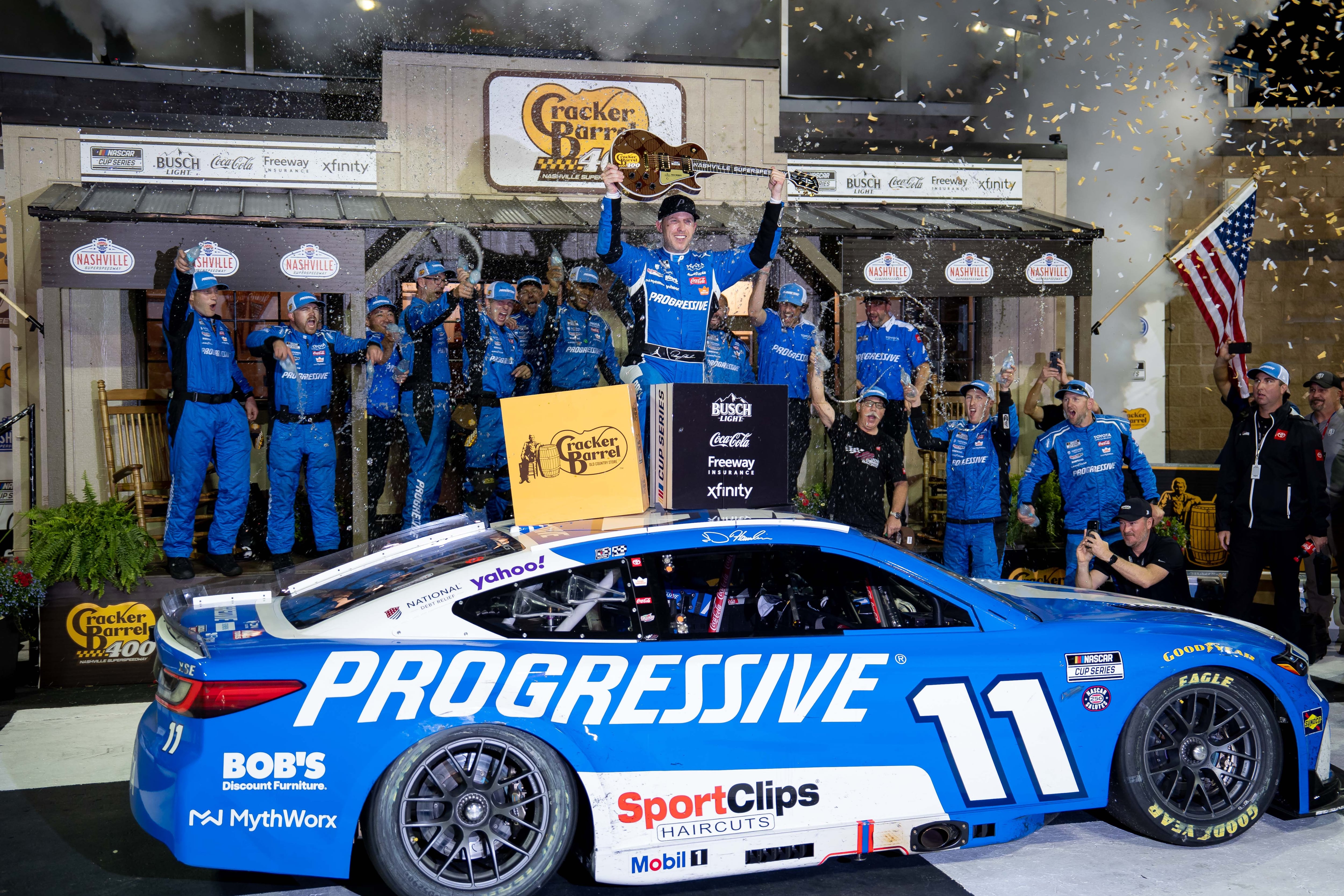 Denny Hamlin storms back from a pole-start penalty to win at Nashville Superspeedway