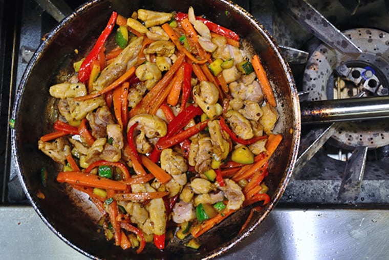 Chicken stir fry with vegetables. (C.F. Sanchez / Staff Photographer)