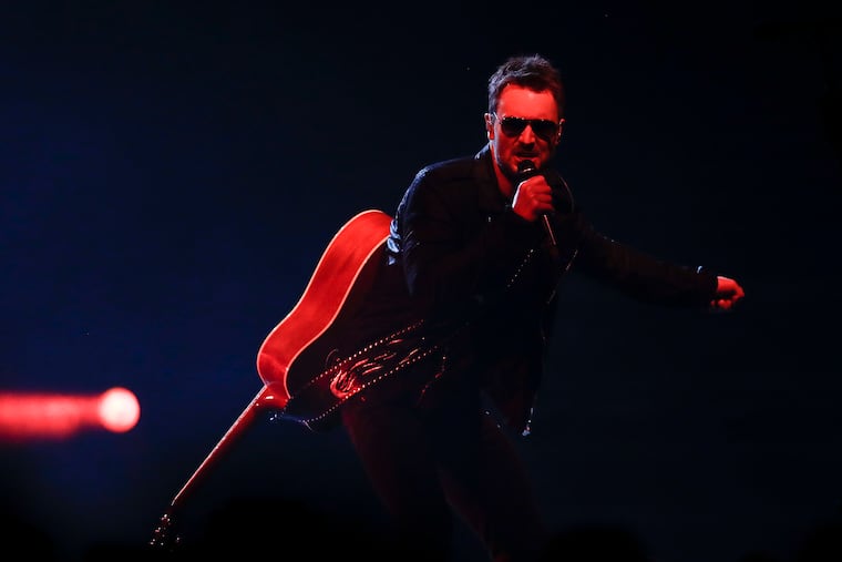 Eric Church and his acoustic guitar connected with the masses for nearly three hours during the Double Down Tour at the Wells Fargo Center in South Philadelphia on Friday, Oct. 11, 2019.