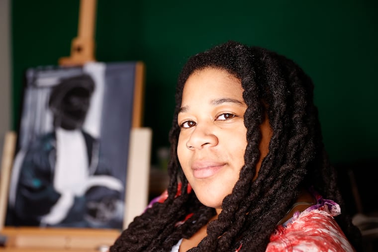 Kai Davis sits in her North Philadelphia home studio on Thursday, January 18, 2024. The Germantown-raised Temple grad plans to help foster the city's resurgent poetry scene. Davis is the new Poet Laureate of Philadelphia