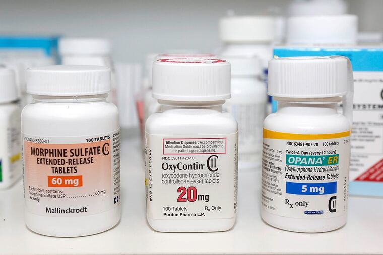 In this Jan. 18, 2013 file photo, Schedule 2 narcotics: Morphine Sulfate, OxyContin and Opana ER are displayed for a photograph in Carmichael, Calif.