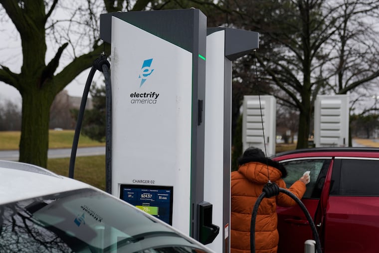 Electric vehicles charge at a station Wednesday, March 11, 2026, in Lincolnwood, Ill.