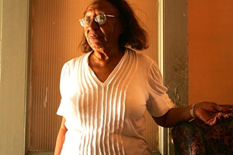 Thelma Causey was hit by a stray bullet when she stepped out of her Kingsessing house during a TV commercial. (DAVID SWANSON / Staff Photographer)
