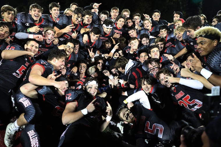 Haddonfield players celebrate South Jersey Group 2 title.