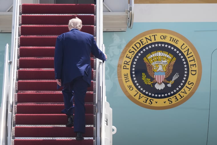 President Donald Trump boards Air Force One at Joint Base Andrews in Maryland on his way to Riyadh, Saudi Arabia, on Monday. Trump wants to accept a gifted luxury jet from Qatar to use as the new presidential plane.