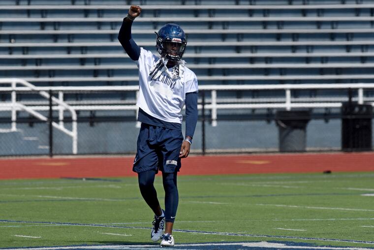 Defensive back Rob Rolle cheers at Villanova football practice August 22, 2017. TOM GRALISH / Staff Photographer