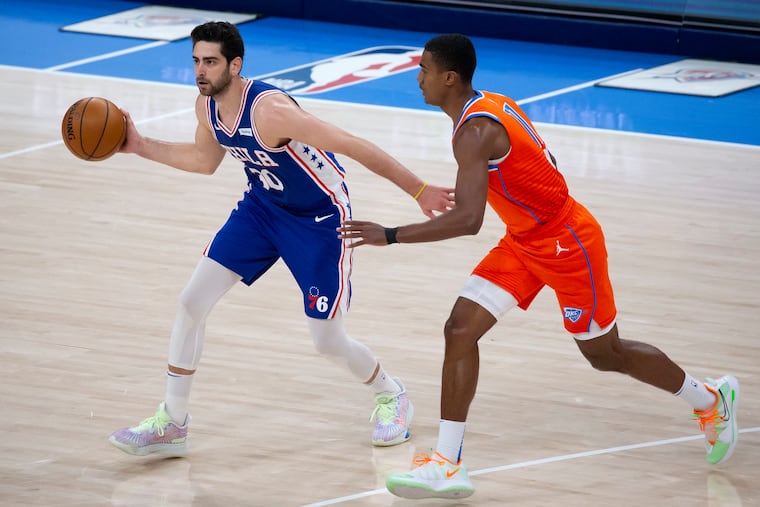 Philadelphia 76ers guard Furkan Korkmaz (30) goes against Oklahoma City Thunder guard Theo Maledon (11) during the second half of Saturday in Oklahoma City.