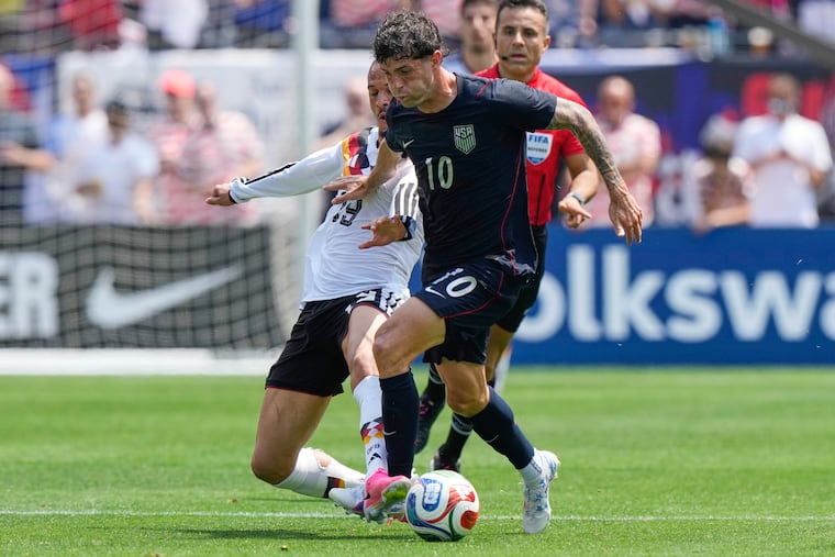 Germany forward Leroy Sané (left), who scored Saturday's game-winning goal, tackling the ball from the United States' Christian Pulisic during the first half.