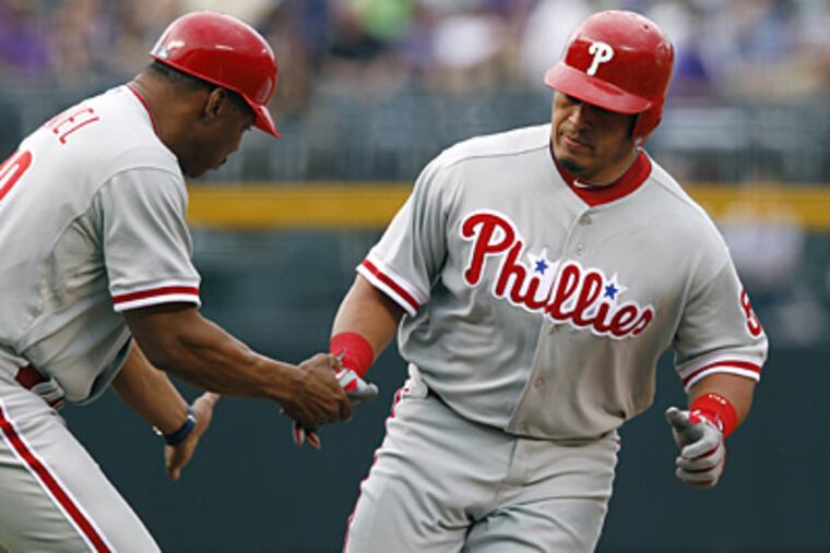 Carlos Ruiz hit a three-run home run during the Phillies' win over the Rockies on Saturday. (David Zalubowski/AP)