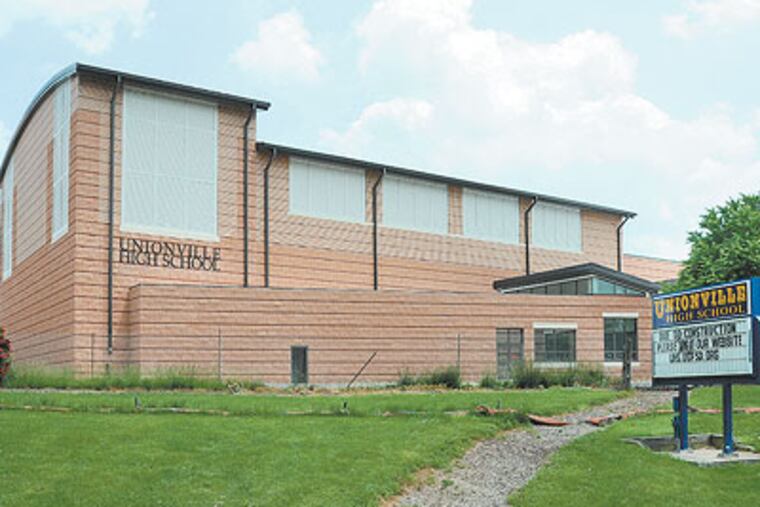 The new Unionville High School is still under construction, but the end of its auditorium was built too high for local zoning laws. (Clem Murray / Staff Photographer)