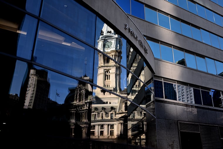 City Hall reflected in windows of 2 Penn Center Feb. 2, 2026.