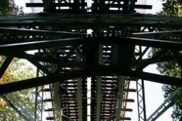 The Crum Creek Bridge near Swarthmore is one of 32 SEPTA spans rated "poor." SEPTA says "poor" bridges were built for heavier trains and are inspected regularly.