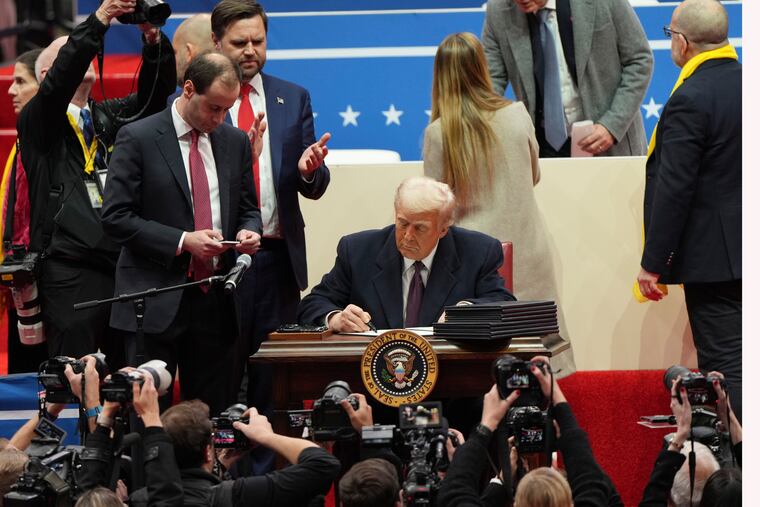 White House staff secretary Will Scharf (from left), Vice President JD Vance, and President Donald Trump at an indoor inauguration event in Washington on Monday.