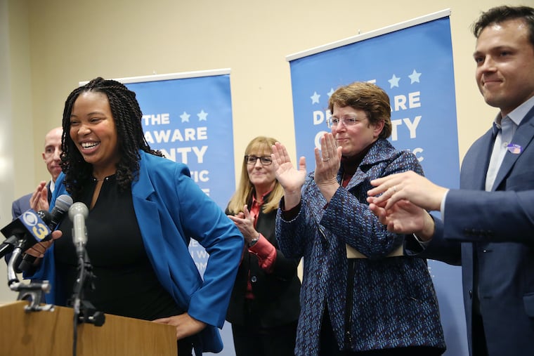From left, current Delaware County Councilman Brian Zidek, newly elected Councilwomen Monica Taylor, Elaine Schaefer, and Christine Reuther, and current Councilman Kevin Madden celebrate during the Delaware County Democratic Committee's election watch party on Nov. 5.