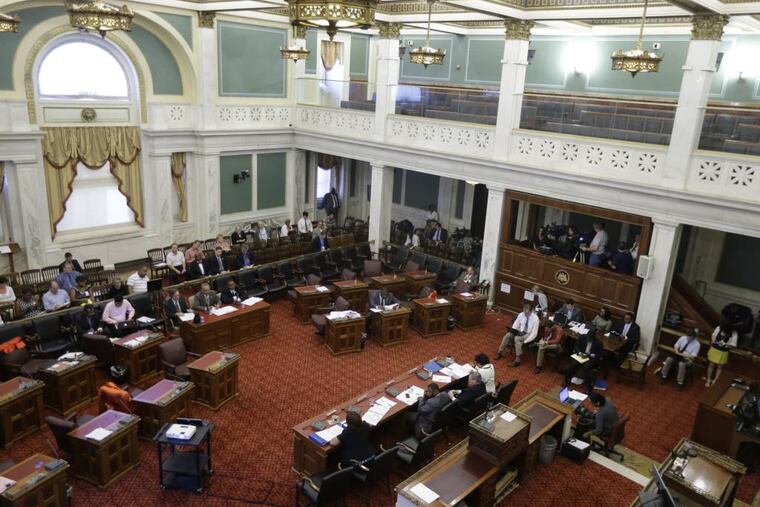 Philadelphia City Council holds a public hearing into the building collapse that killed six people and injured 13 others earlier this month, Wednesday, June 19, 2013, in Philadelphia. (AP Photo/Matt Rourke)
