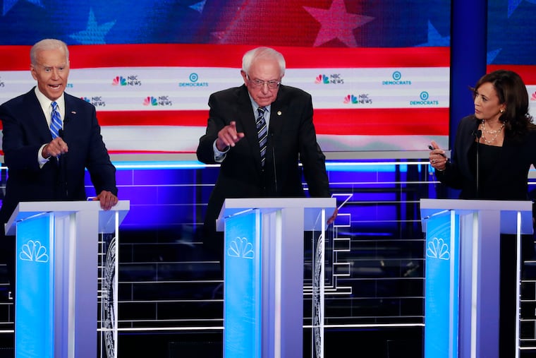 Former Vice President Joe Biden (left) and Sens. Bernie Sanders of Vermont and Kamala Harris of California during Thursday night’s debate in Miami.