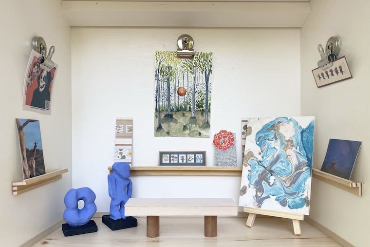 Tiny artworks including sculptures and paintings are shown in D.C.’s Free Little Art Gallery. Allyson Klinner)