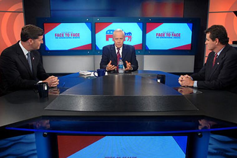Larry Kane (center) goes over ground rules before the taping of debate last month between Democratic U.S. Rep. Patrick Murphy (left) and Mike Fitzpatrick (right), Murphy's Republican opponent in the 8th Congressional District election. (Tom Gralish / Staff Photographer)