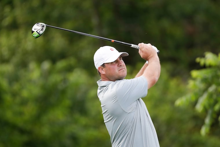 Jeff Osberg watches his tee shot during last year's Philadelphia Amateur at Stonewall. Osberg became the second player in Golf Association of Philadelphia history to complete the career Grand Slam by winning the GAP Middle-Amateur at LedgeRock.