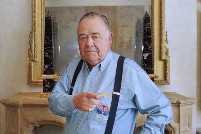 Comedian Jonathan Winters reacts as he poses for a photograph on Monday, May 6, 1997 at a Beverly Hills hotel in Beverly Hills. At 71 he can be considered the grand master of standup comedians. (AP Photo/Damian Dovarganes)