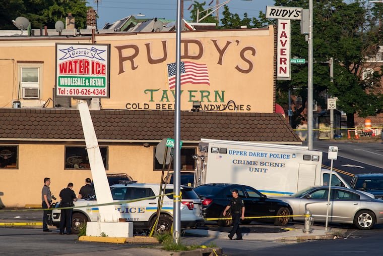 Upper Darby police investigate a homicide outside the Rudy's Tavern in Upper Darby.