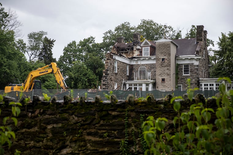 Demolition of a late 19th-century mansion on Carpenter Lane in the West Mount Airy section of Northwest Philadelphia temporarily ceased after neighbors complained about potential asbestos contamination in late June. But a local developer still plans to build six luxury homes on the three-acre site.