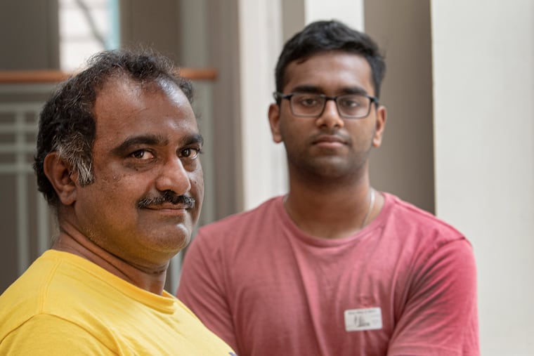Sewa volunteers Vijay Mallampati (left) and Anurag Tadapaneni at the Pennsylvania Convention Center.