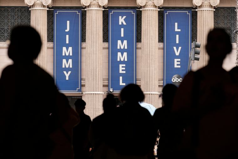FILE - People walk by the Jimmy Kimmel Live studio on Hollywood Blvd., on Sept. 17, 2025, in Los Angeles. (AP Photo/Chris Pizzello)