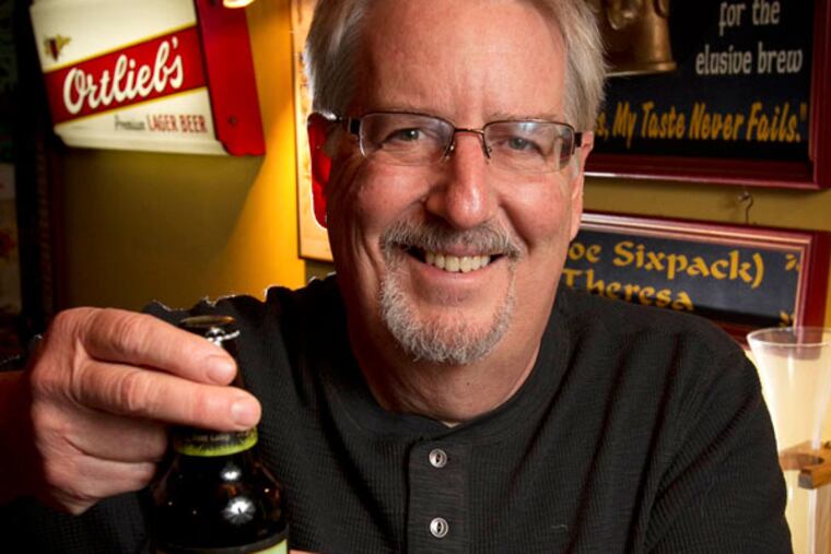 Beer aficionado Don Russell with with Beer Camp, Belgian Style Black IPA.. ( ALEJANDRO A. ALVAREZ / STAFF PHOTOGRAPHER )