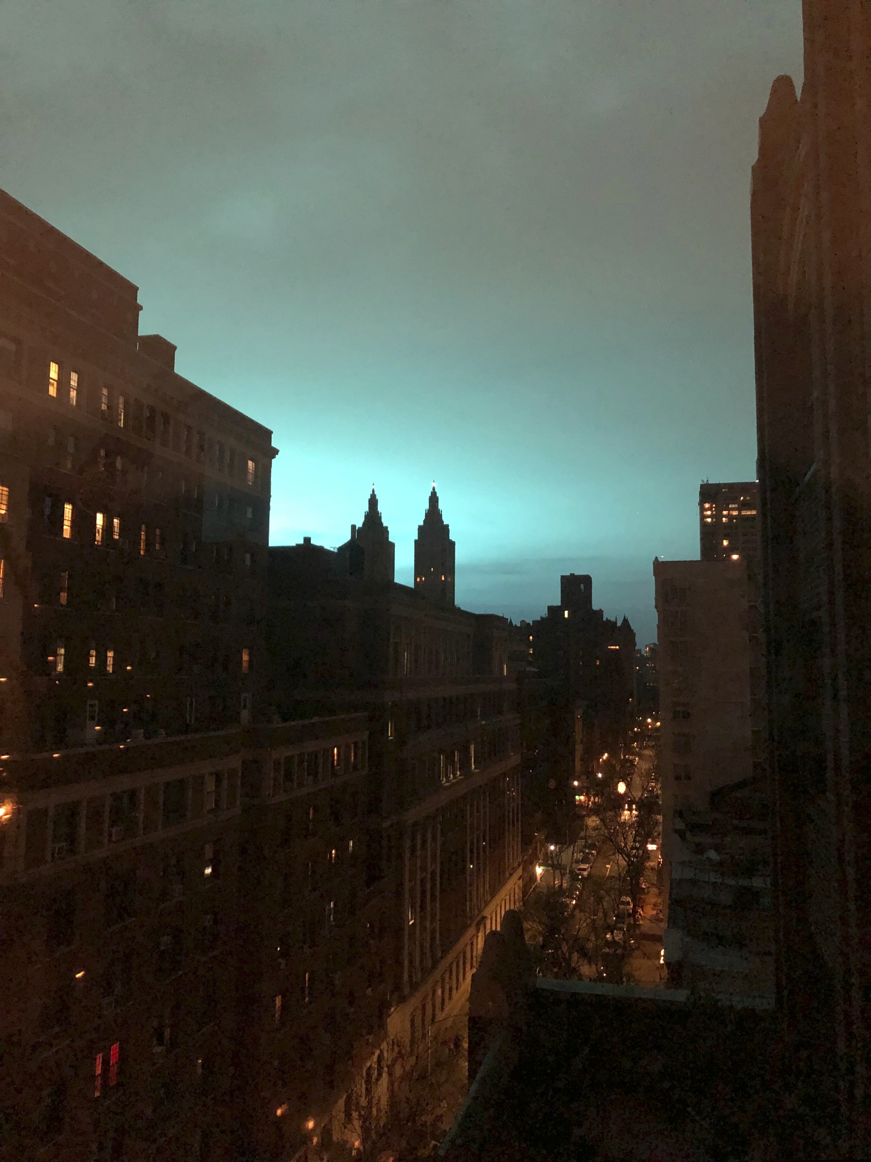 This photo shows blue light over New York, as seen from Manhattan Brough of New York on Thursday, Dec. 27, 2018. New York police said a transformer exploded at a Con Edison facility in Queens on Thursday, causing some power outages. (AP Photo/Jay Reeves)