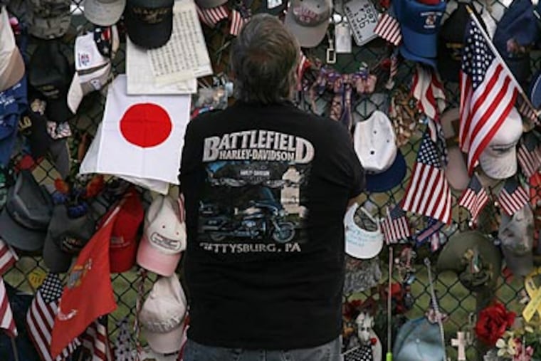 Visitors gathered Thursday at a memorial to the passengers of Flight 93 at the crash site in Shanksville, Pa., on the eve of the anniversary of the 9/11 attacks. (Laurence Kesterson/Staff Photographer)