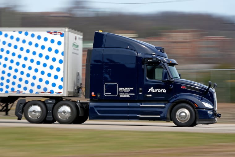 A self-driving tractor trailer maneuvers around a test track in Pittsburgh in March.
